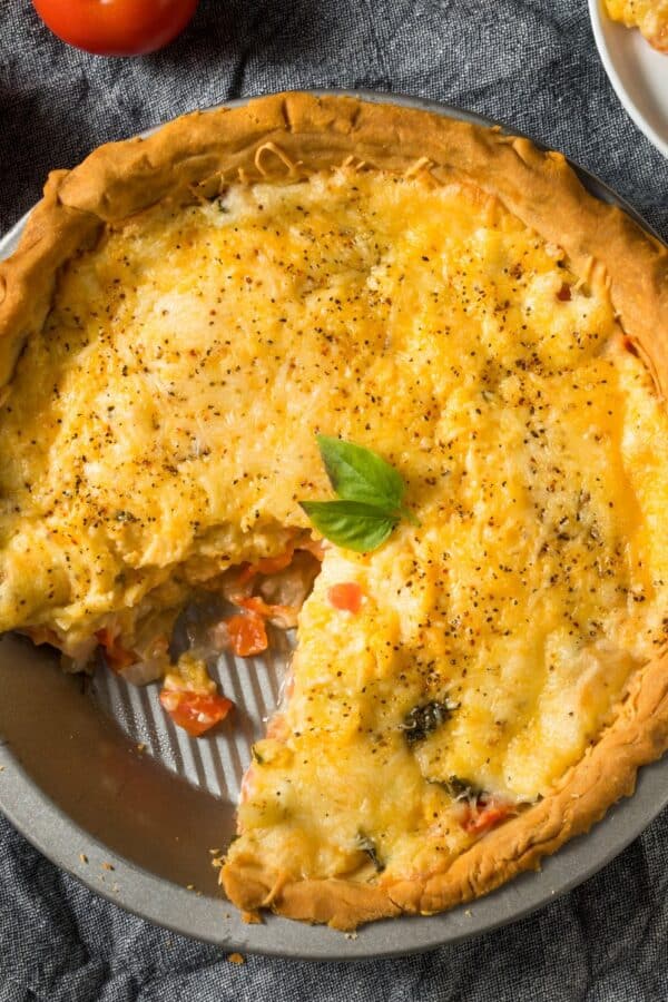 Tomato Pie with a slice cut out of it