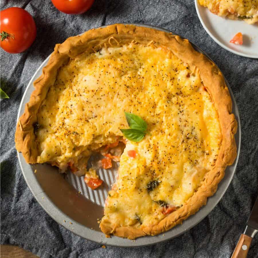 Tomato Pie with a slice cut out of it