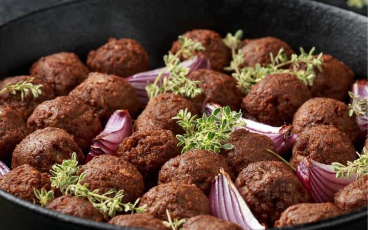 Close up image of Vegan Meatballs in a skillet
