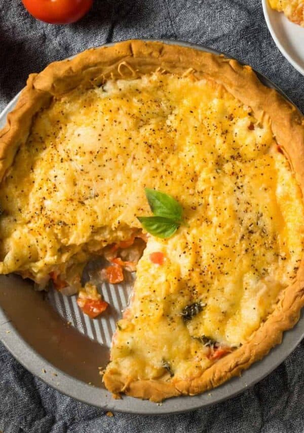 Tomato Pie with a slice cut out of it
