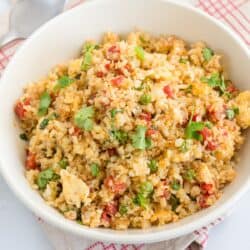 Brassica oleracea Overhead image of Cauliflower Fried Rice in a white bowl