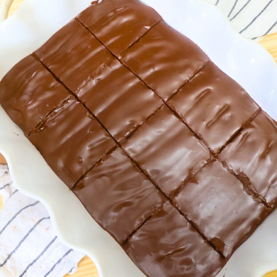 Overhead image of Lunch Lady Brownies in a white baking dish cut into 12 brownies