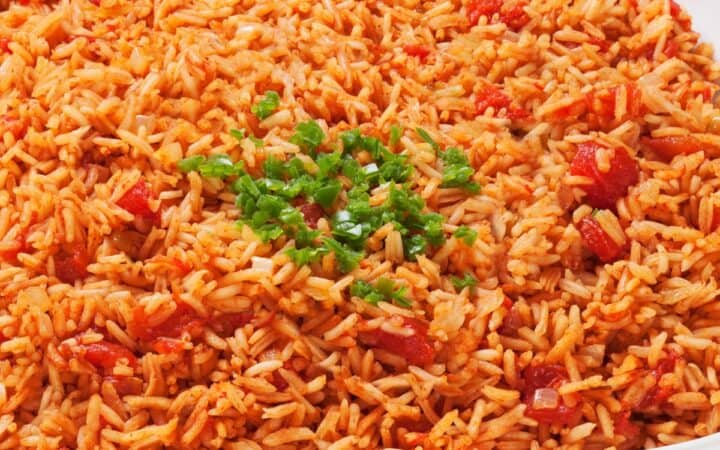 Close up image of Spanish Rice in a white bowl