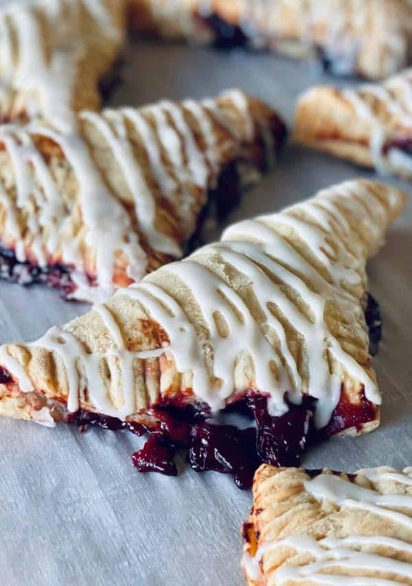 Close up image of Cherry Turnovers on parchment paper