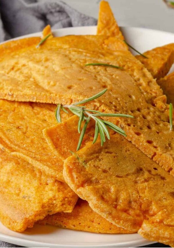 Close up image of socca with herbs