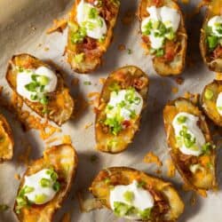 Overhead image of Loaded Potato Skins on parchment paper