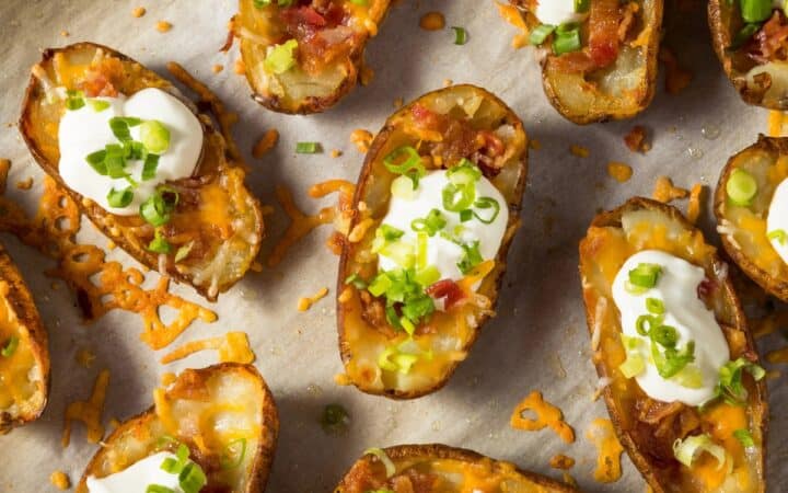 Overhead image of Loaded Potato Skins on parchment paper