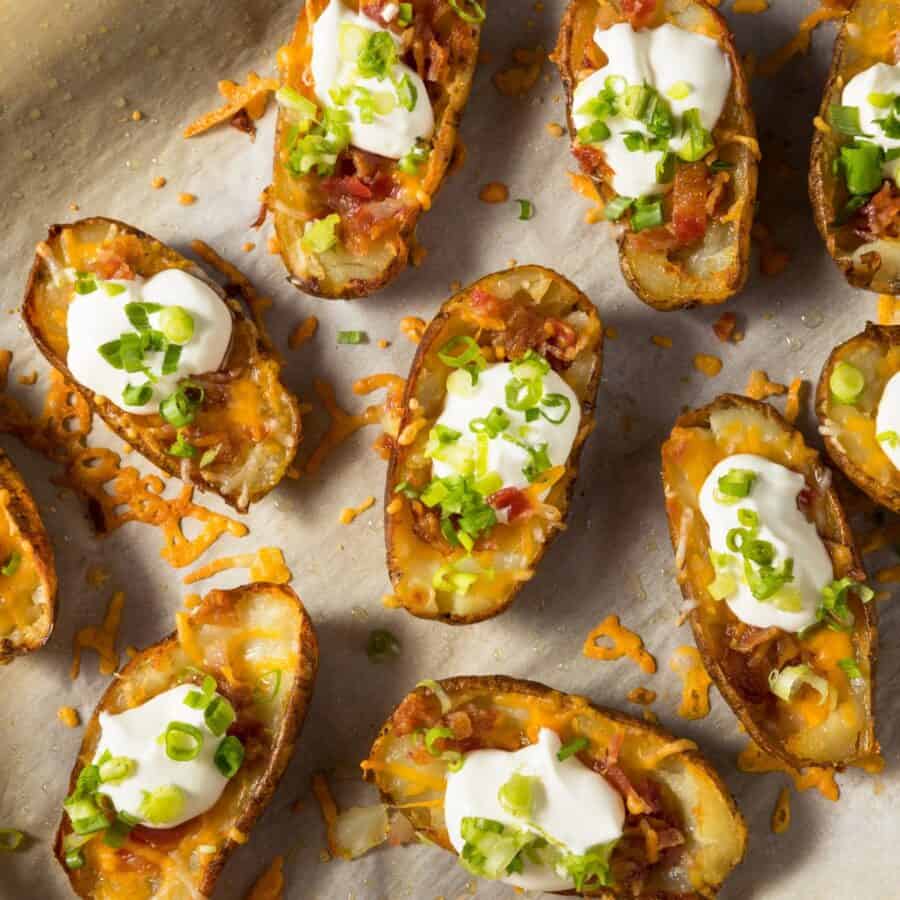 Overhead image of Loaded Potato Skins on parchment paper