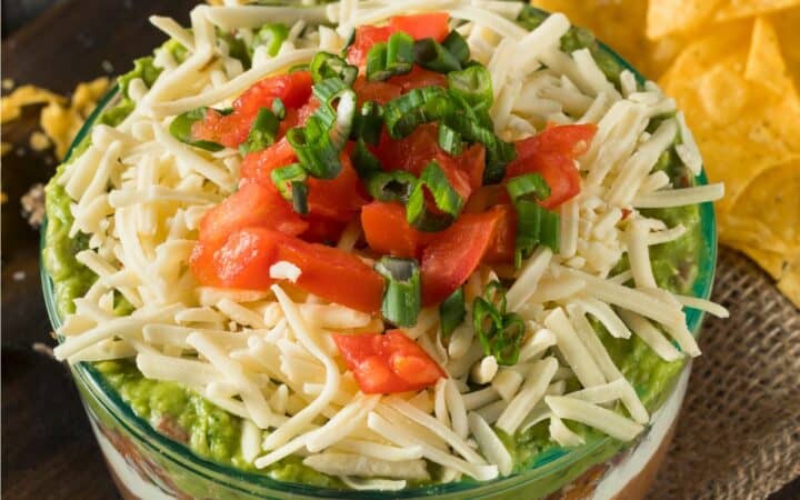 Overhead image of Seven Layer Dip in a glass bowl