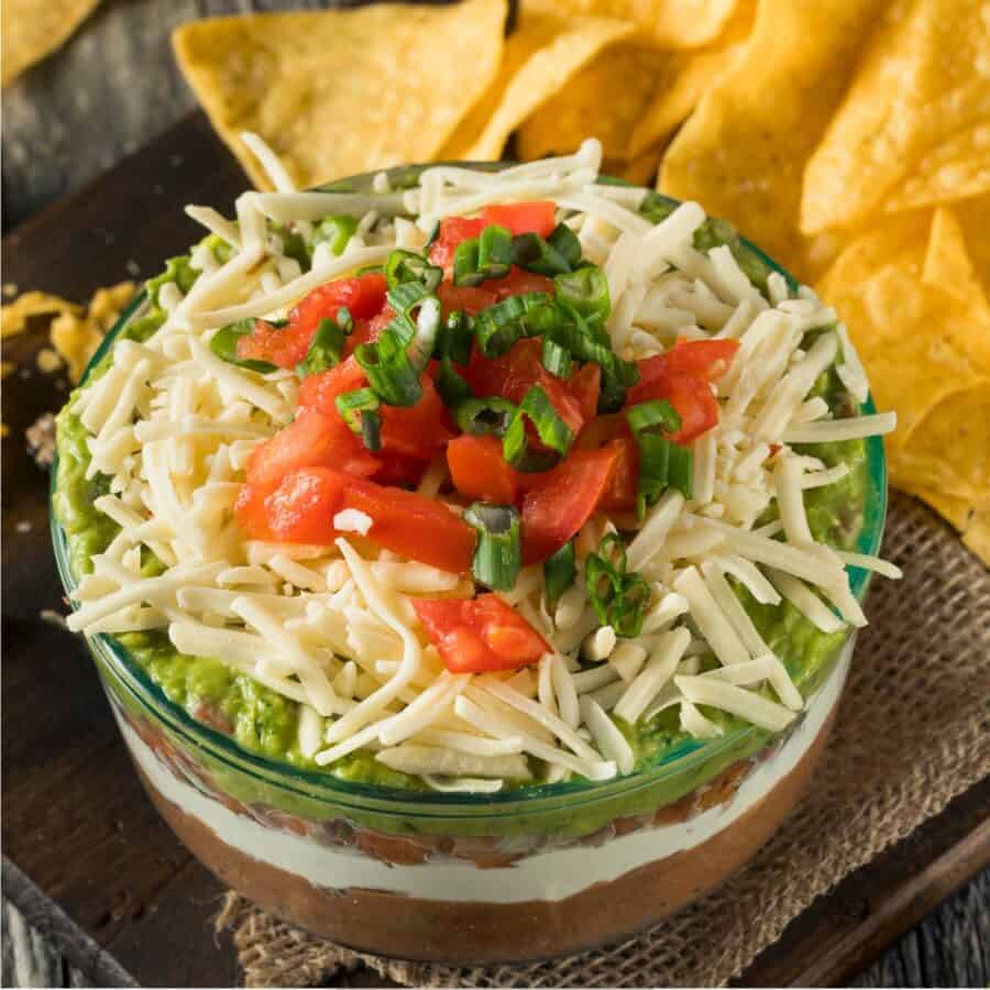 Overhead image of Seven Layer Dip in a glass bowl