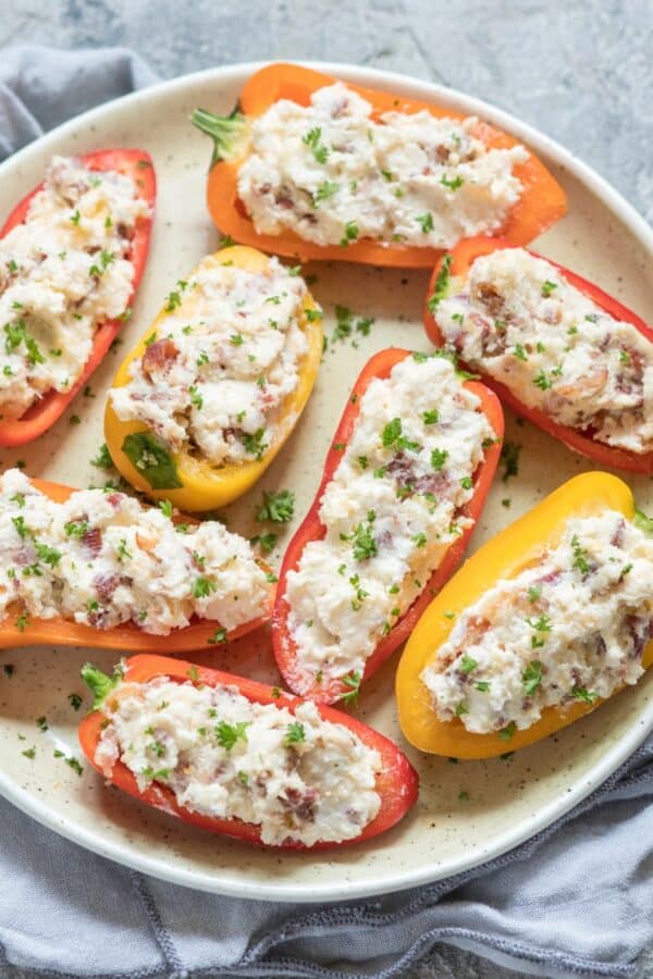 Overhead image of Stuffed Mini Peppers on a white plate
