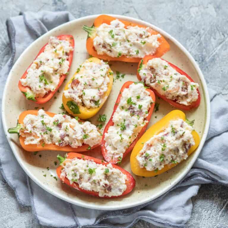 Overhead image of Stuffed Mini Peppers on a white plate
