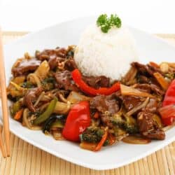 Beef Chop Suey on a white plate with rice