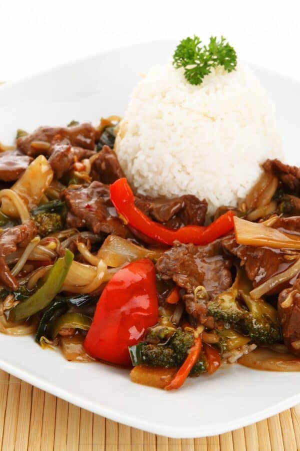 Beef Chop Suey on a white plate with rice