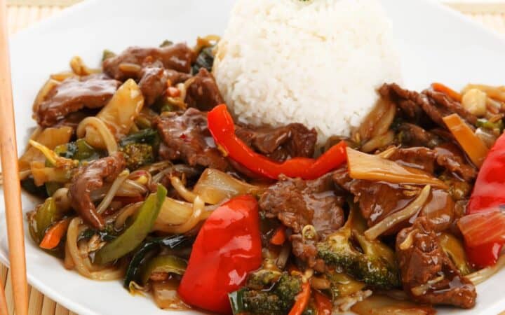 Beef Chop Suey on a white plate with rice