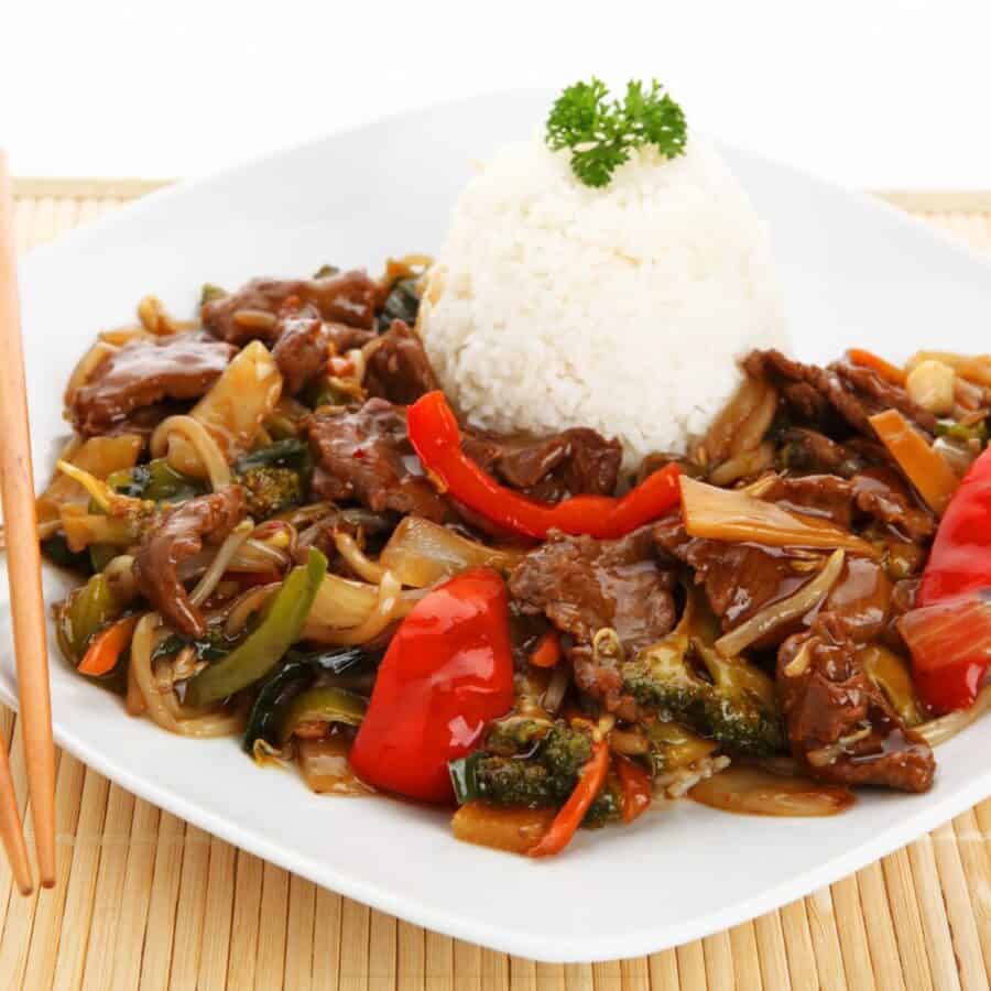 Beef Chop Suey on a white plate with rice