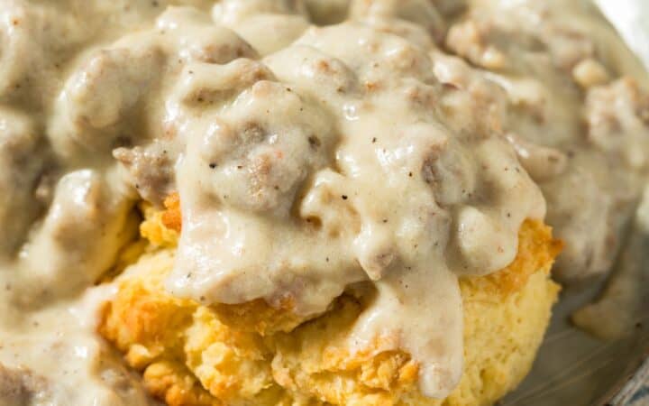 Close up image of Biscuits and Sausage Gravy on a plate