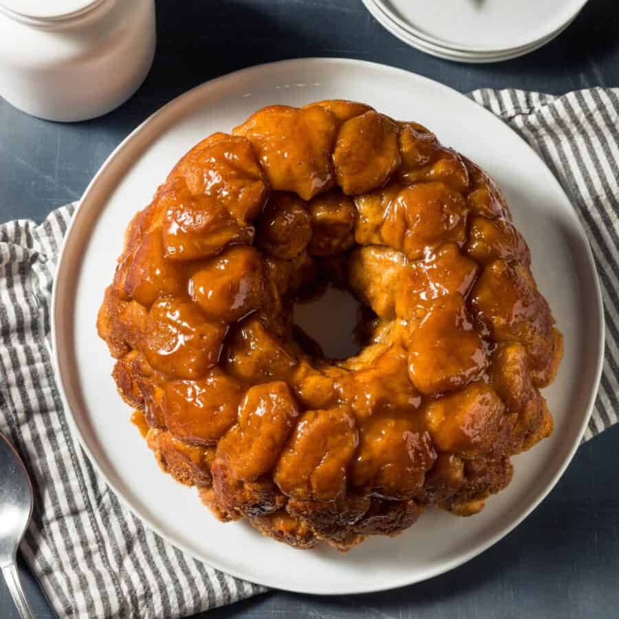 Overhead image of Cinnamon Roll Monkey Bread on a white plate