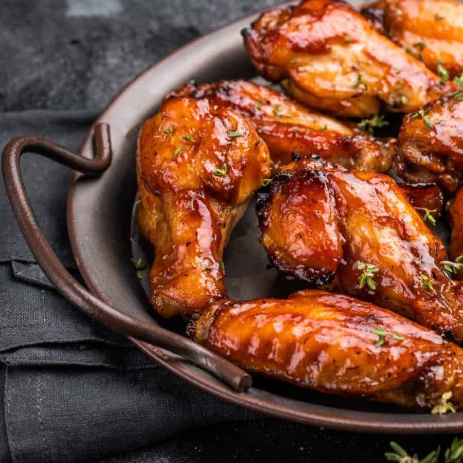 Close up image of Hot Hone yWings on a serving tray