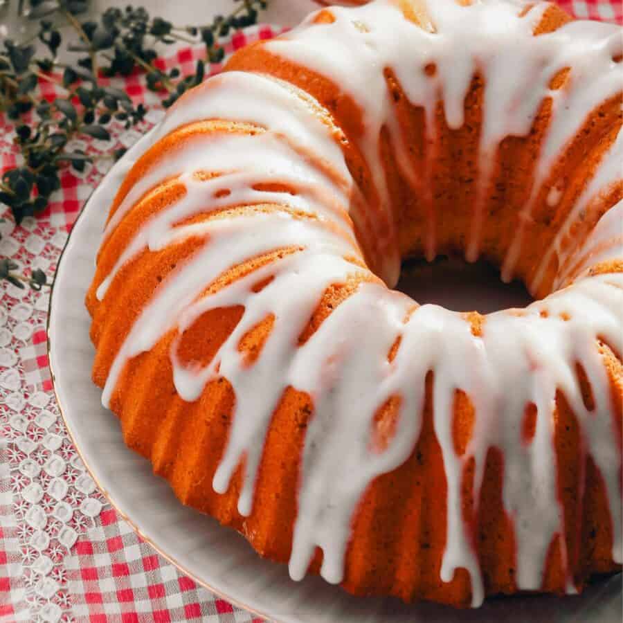 overhead image of Pumpkin Bundt Cake with glaze drizzle