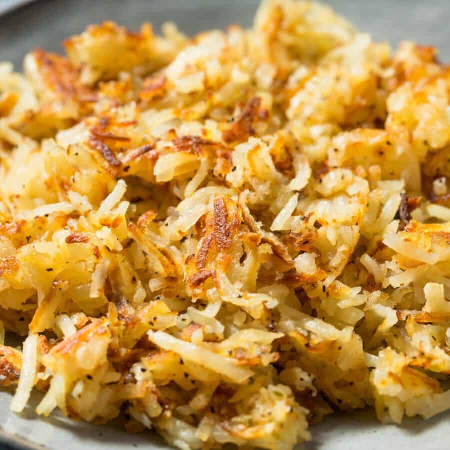 Close up image of homeade hashbrowns on a plate