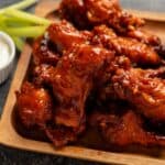 Overhead image of Mango Habanero Wings on a wooden platter - 8