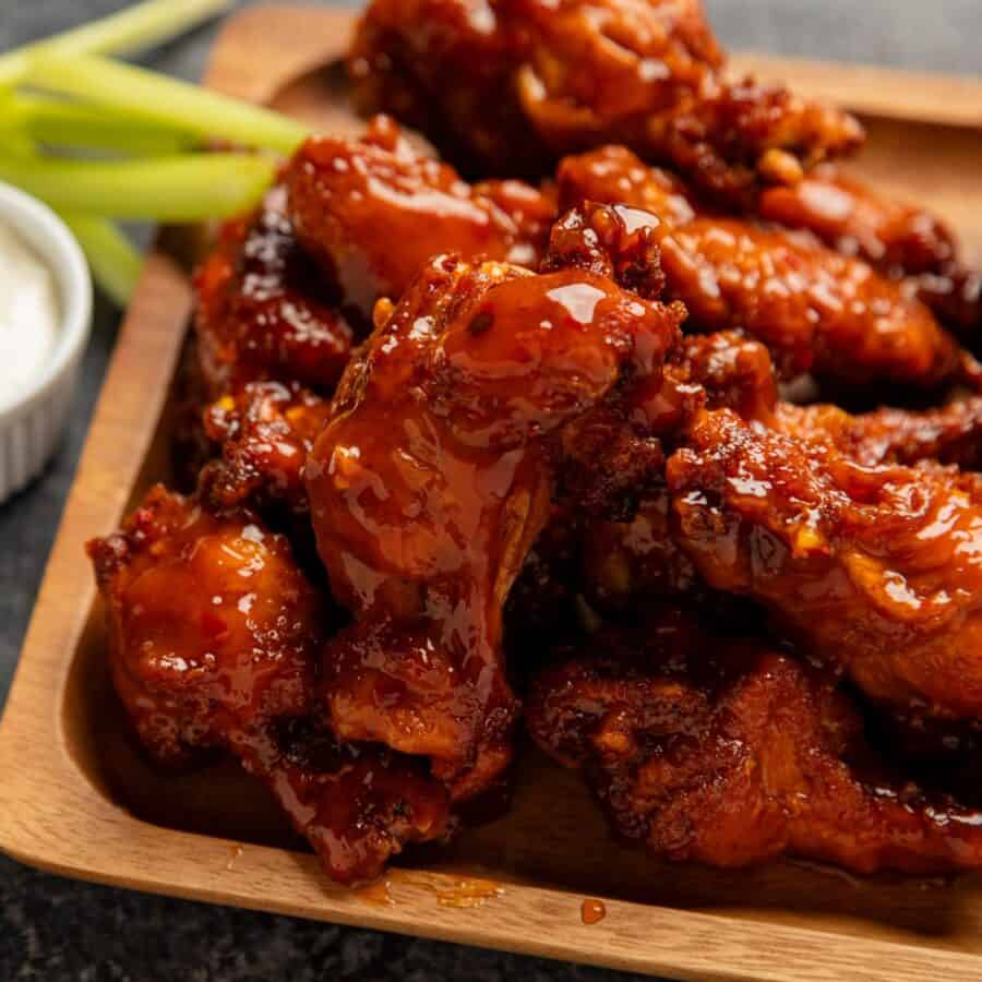 Overhead image of Mango Habanero Wings on a wooden platter 