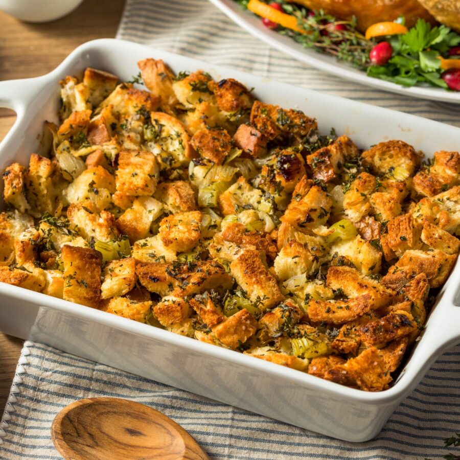 Sausage Stuffing in a white baking dish 