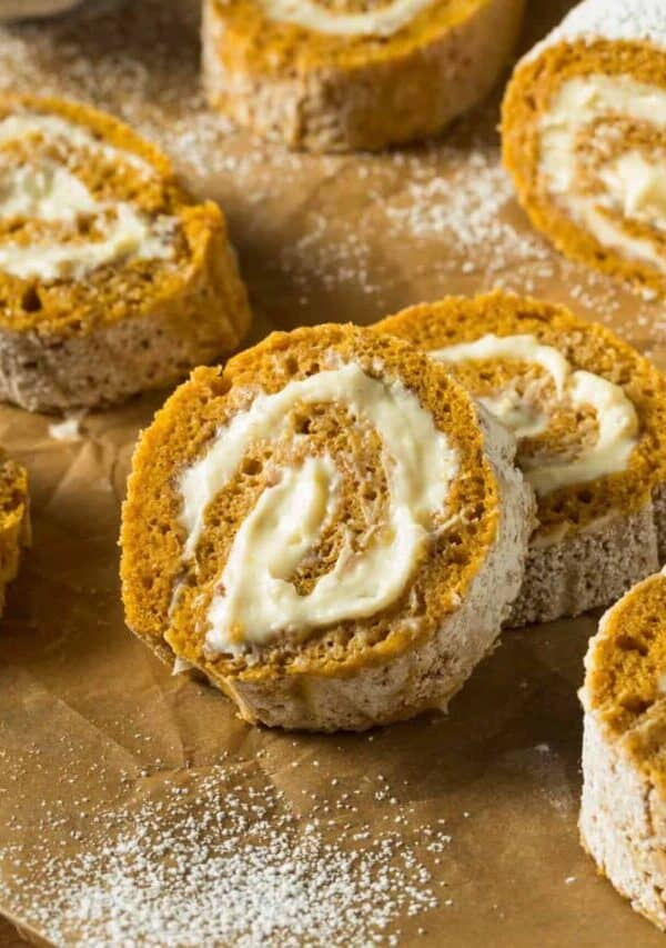 Close up image of Pumpkin Roll Slices on parchment paper