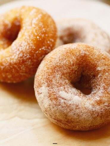 Keto Donuts on a neutral wooden surface