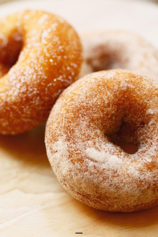 Keto Donuts on a neutral wooden surface