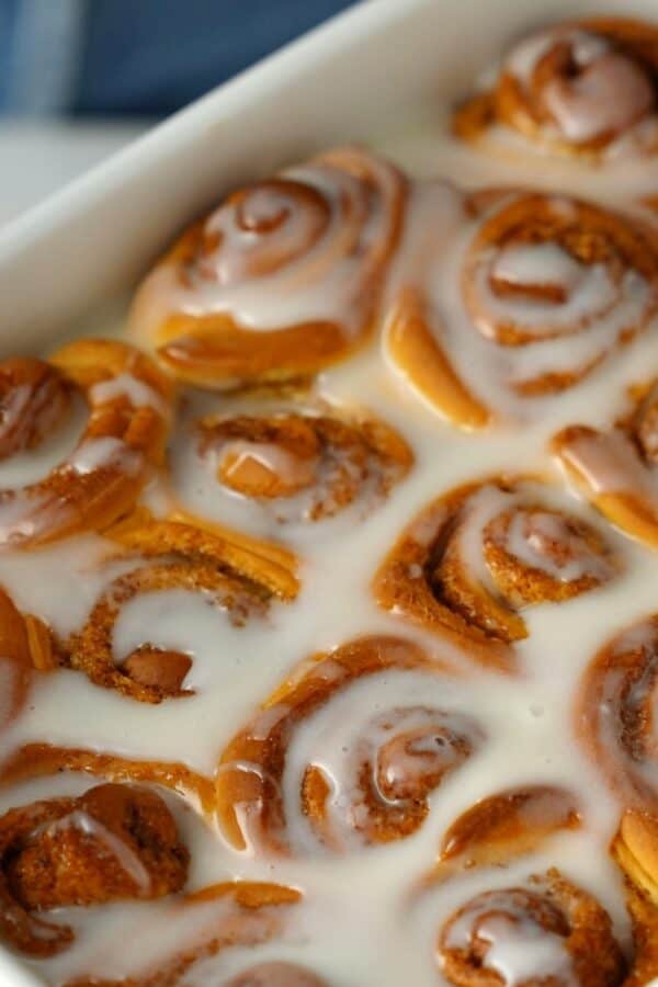 Close up image of Orange Rolls in a baking pan