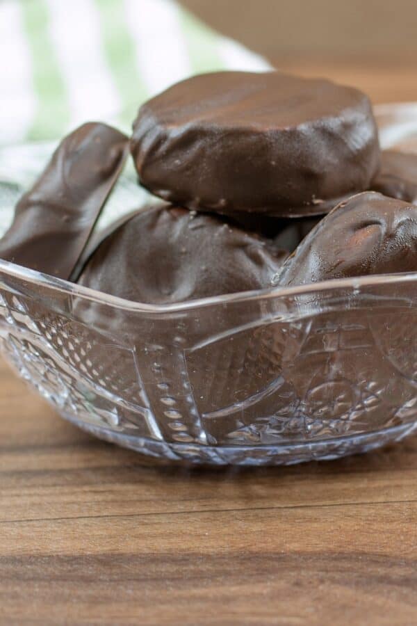Peppermint Patties stacked in a clear bowl