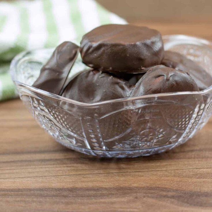 Peppermint Patties stacked in a clear bowl