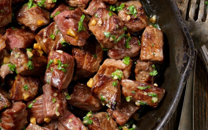 Overhead image of slow cooker steak bites