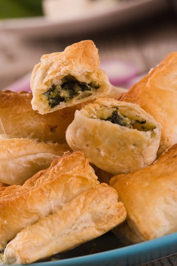 Spinach Puffs stacked on a plate