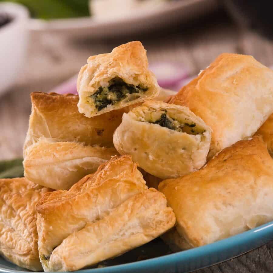 Spinach Puffs stacked on a plate
