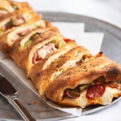 Close up image of stromboli on a plate