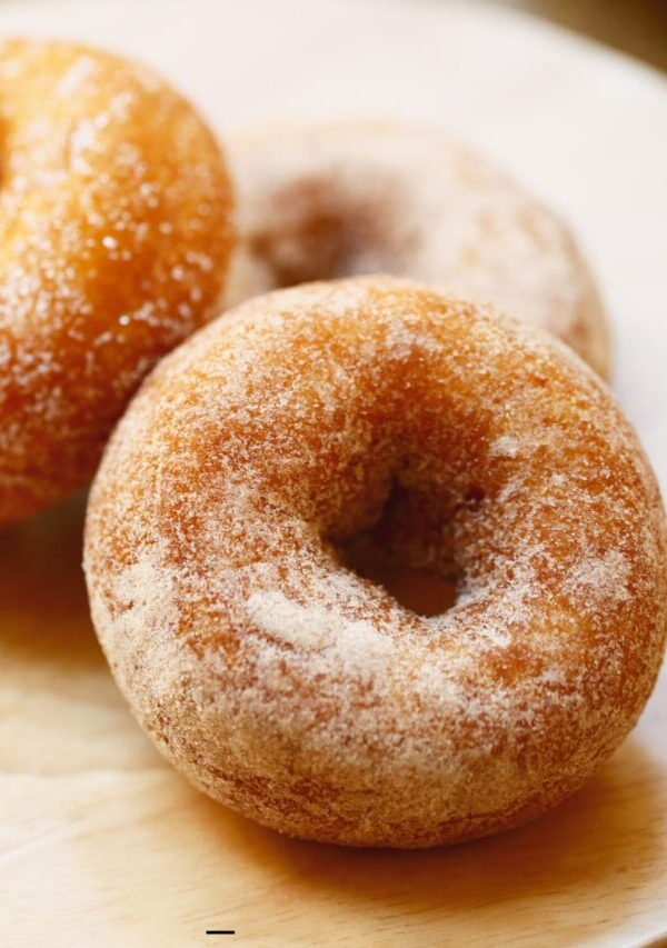 Keto Donuts on a neutral wooden surface