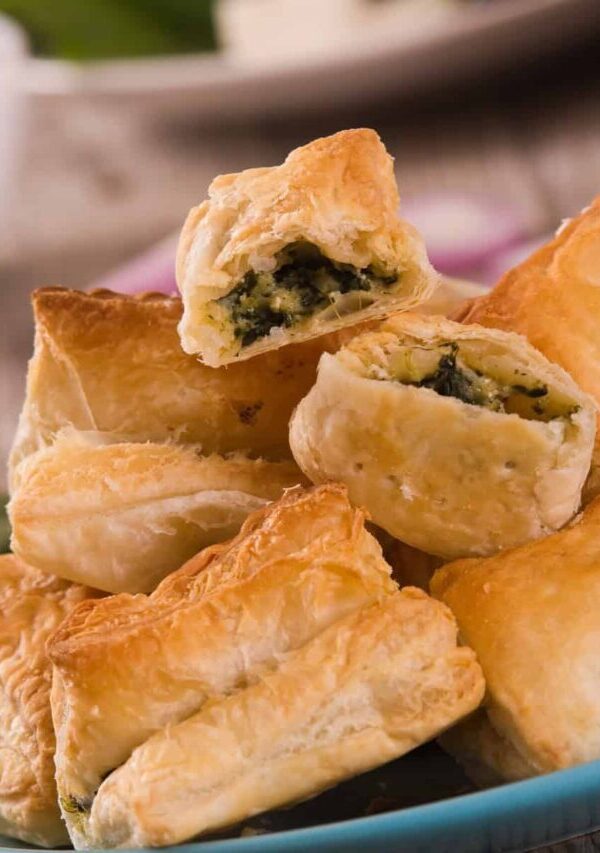 Spinach Puffs stacked on a plate