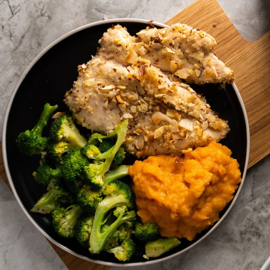 Overhead image of Almond Crusted Chicken on a plate with broccoli and sweet potato mash - 3