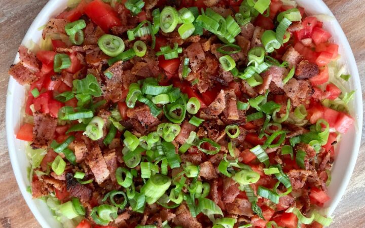 Overhead image of blt dip in a white bowl