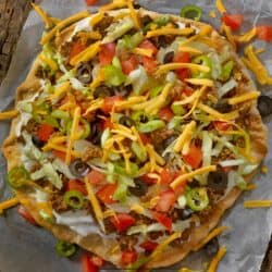 Overhead image of Taco Pizza on parchment paper