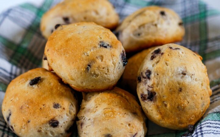 Blueberry Biscuits on a plaid cloth stacked in a pile - 5