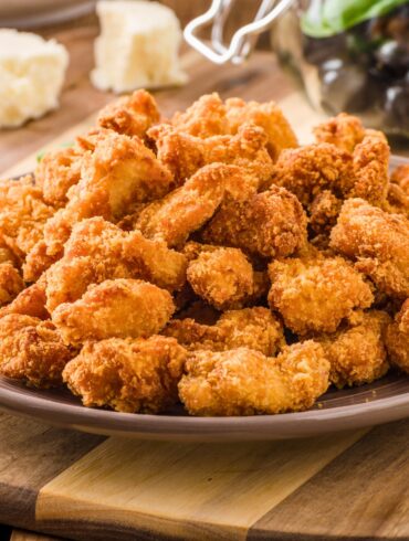 a large pile of keto chicken nuggets on a plate