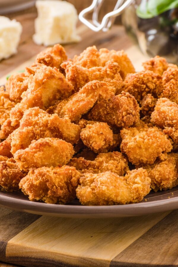 a large pile of keto chicken nuggets on a plate