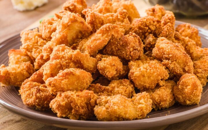 a large pile of keto chicken nuggets on a plate