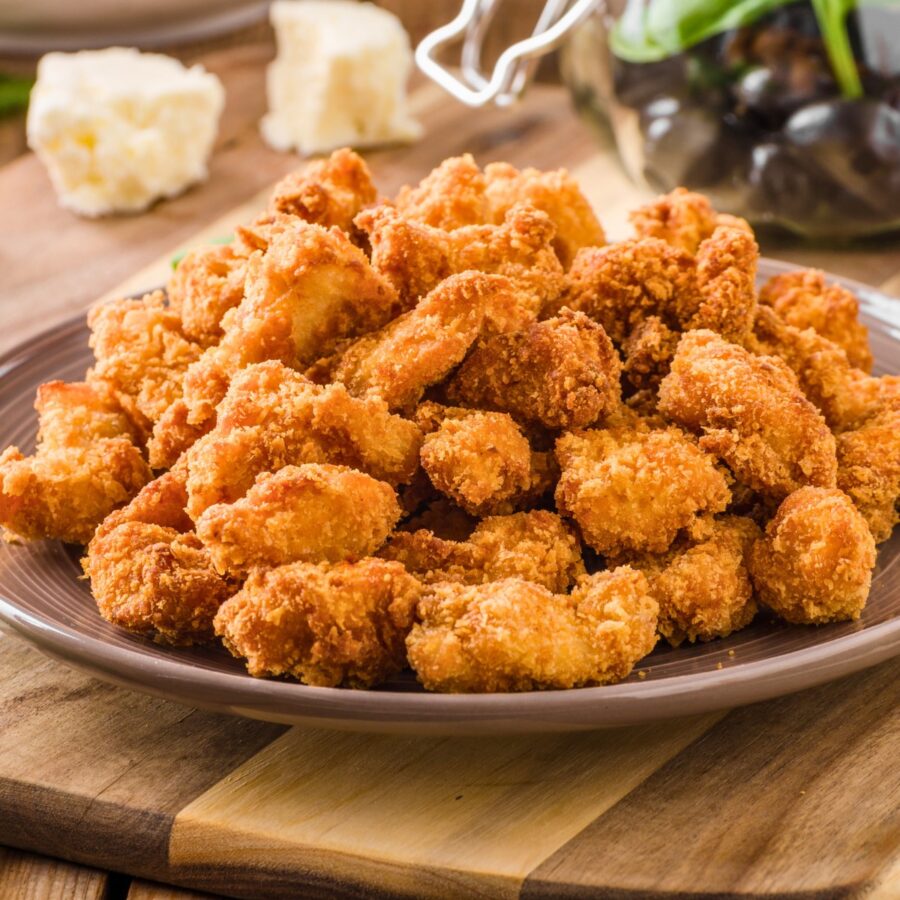 a large pile of keto chicken nuggets on a plate