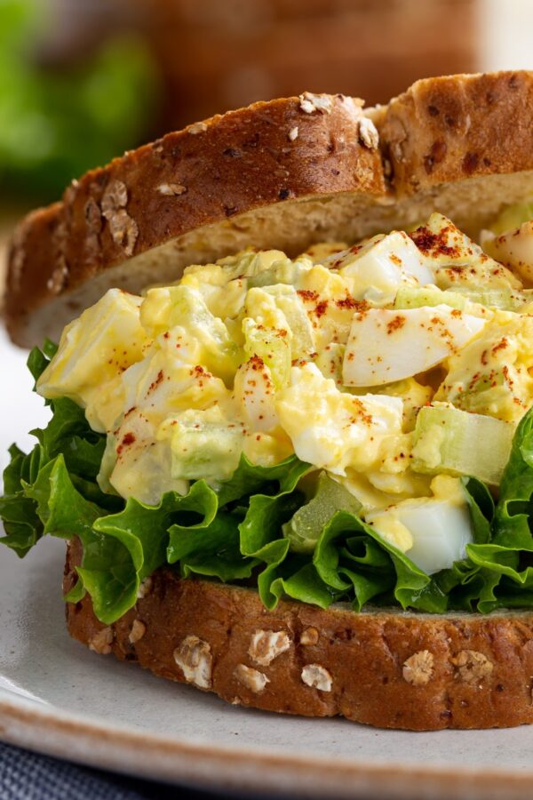 Close up image of an Egg Salad Sandwich on wheat bread