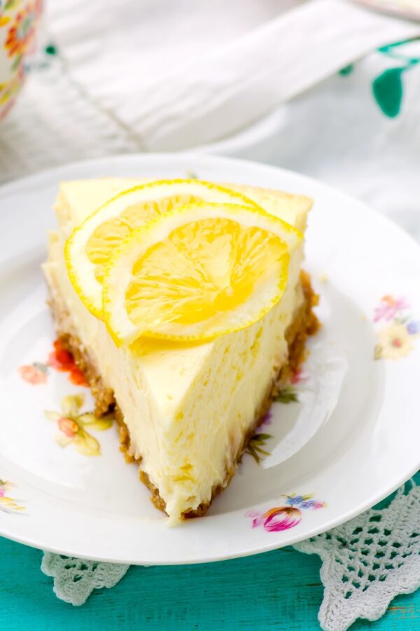 Close up image of lemon cheesecake on a decorative plate